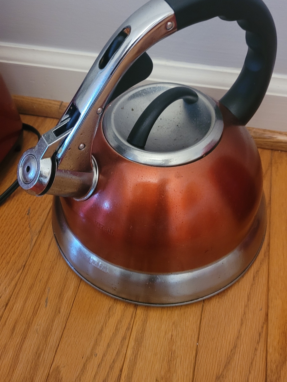 Red Whistling Tea Kettle with Black Handle